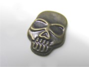 CONVEX METALLIC STUDS B SKULL 8X12 MM BROWN