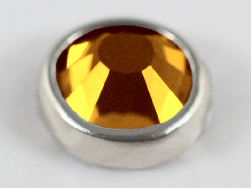 TOPAZ PLUS RHINESTONES SS16 WITH SILVER RING